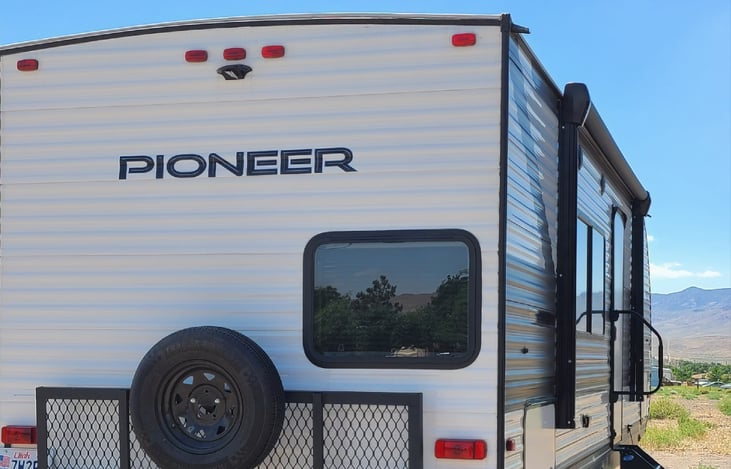 Tailgate holds the generator if you need it, also can hold your ice chest if you bring one!
