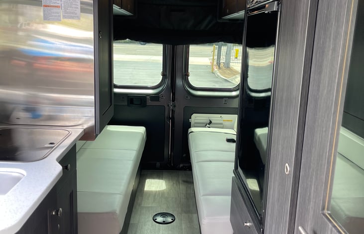 One push of a button and the two benches come together to make a king size bed