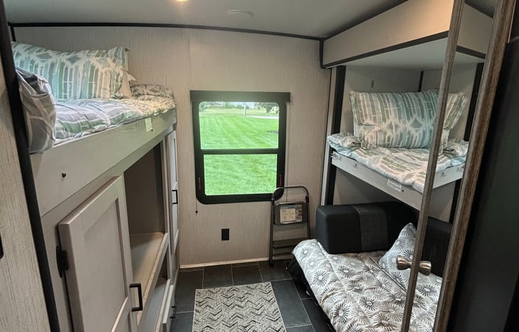 Bunk rooms for the kids! Tv included in room. Enjoy while connecting to a hot spot.