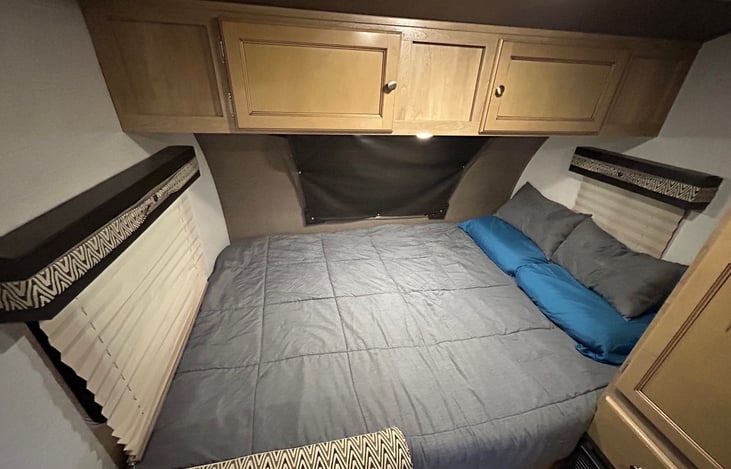 Queen bed. (Pillows and bedding not included.)