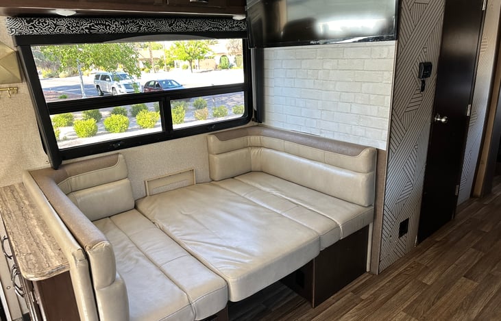 Bed #3 - Dinette converts into a bed that can fit two individuals (ideally 6ft tall or less for comfort). 

Photo from before renovations