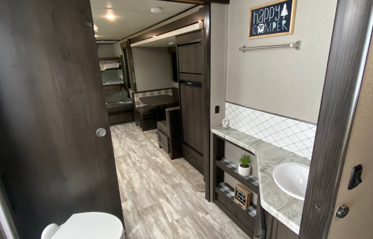 HUGE bathroom! plenty of towel storage (8 provided towels for your use) storage cabinets above and below sink.