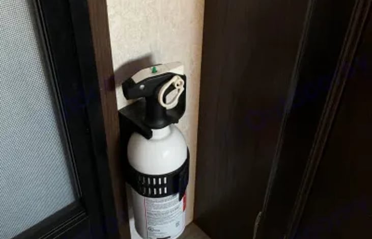 fire extinguisher by front door for emergency