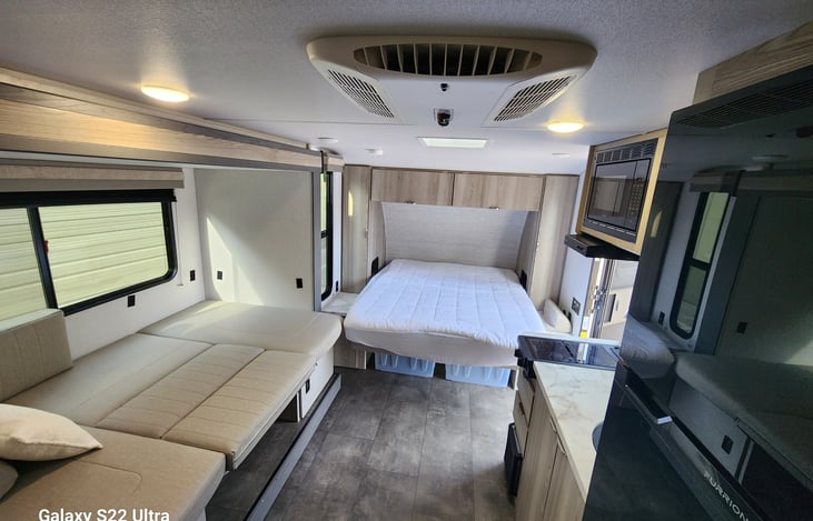 Dinette comes down to a bed big enough for two.
The mattress at the front is a queen size.