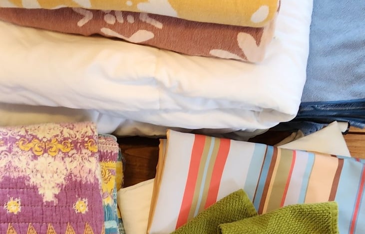 Linens for sleeping, keeping warm, dining, bathing, and even for the beach.