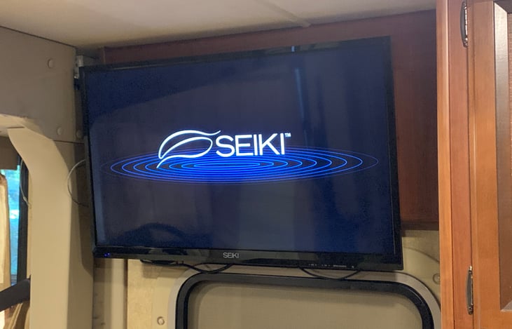 32 inch smart TV in dining/kitchenette area.