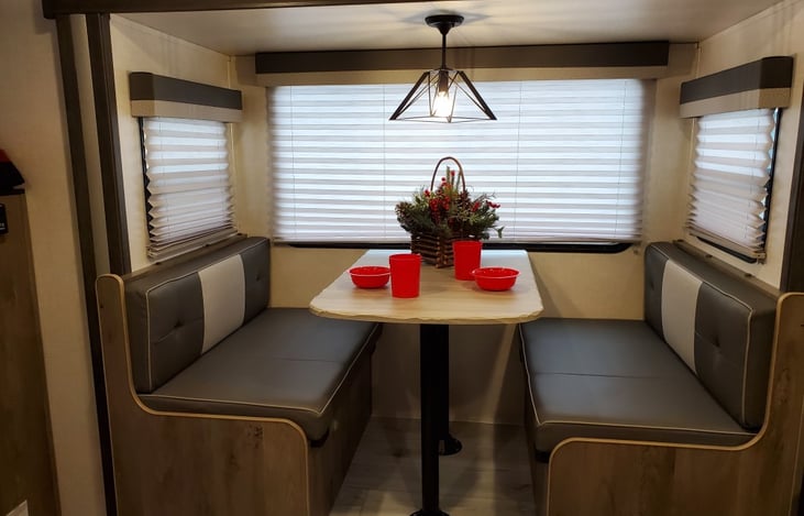 Cozy enough for 2 or seats 4. Also converts to smaller people sleeping.