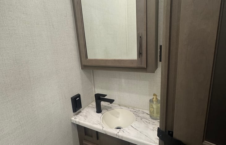 Part of the half bathroom