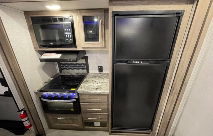 3 Burner Gas Stove, Gas Oven, Microwave, and Refrigerator