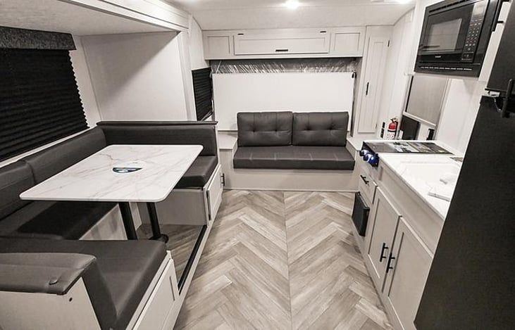 The couch folds flat and the murphy bed comes down on top giving more room during the day and a nice queen bed to sleep on at night.