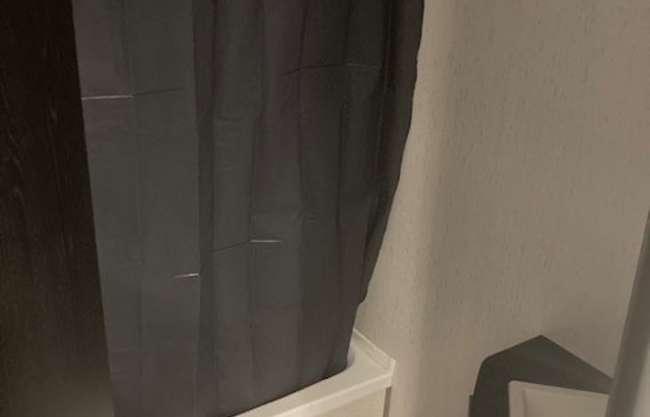 Step in tub/shower with lots of headroom.