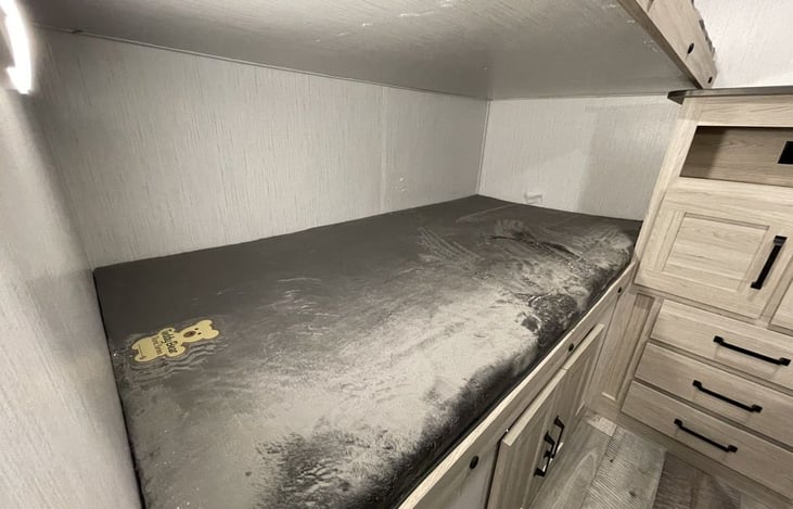 Teddy Bear Bunk Mats w/ a nice storage area for clothing and anything else the kiddos need to store.