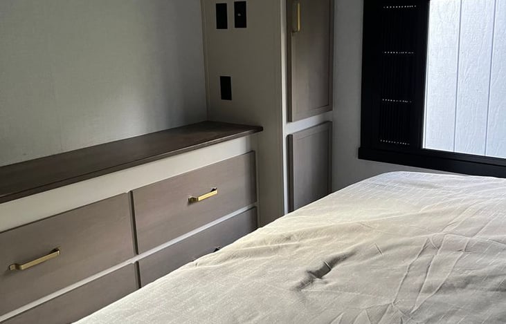 Cabinets and closet in master bedroom