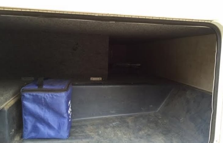 plenty of storage. You can open both sides of the rv and storage goes from one side the other un interrupted perfect for sur**oards or longer items.