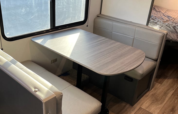 Dinette converts to an additional bed.