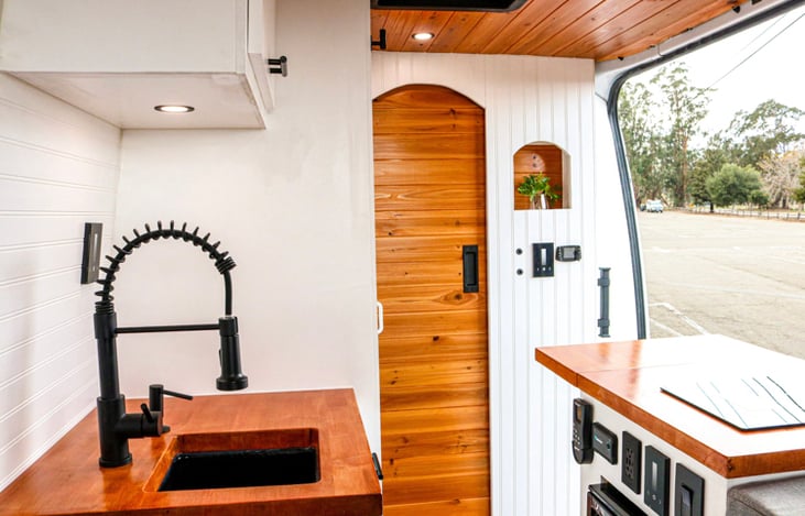 Separate cab and living areas that opens from waiter side. Diesel heater and assistant handle for east step up into the van.