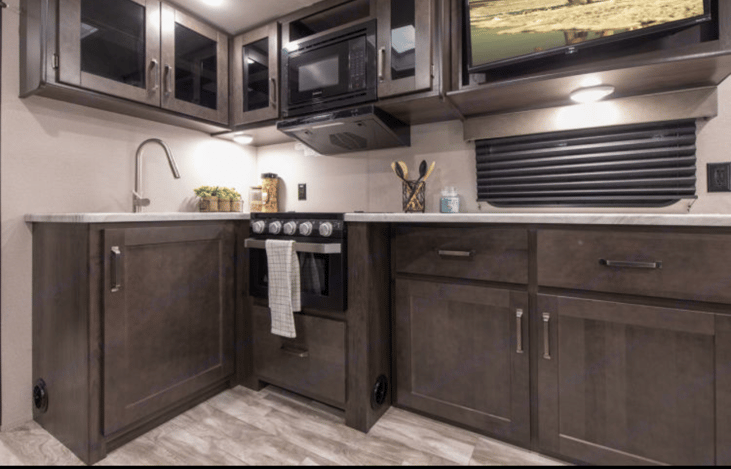 Equipped with everything you could possibly need to prepare a yummy meal! Dishes, pots/pans, spices, microwave, gas stove/oven, Keurig, toaster, blender