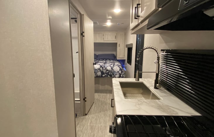 View (from the dining booth) of the bedroom at the front of the camper.