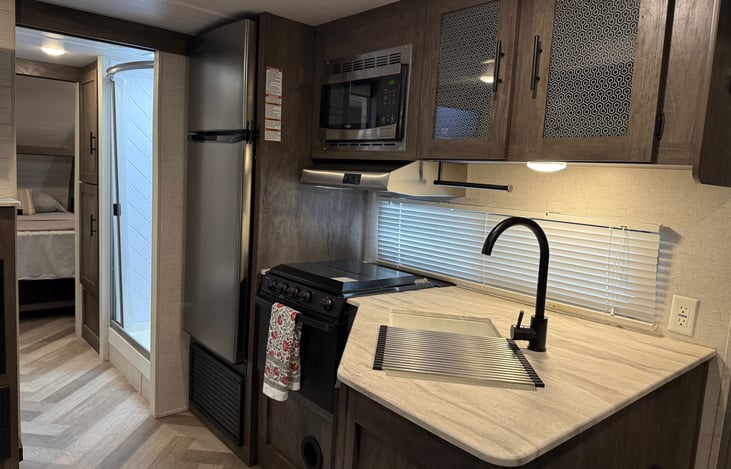 Ample cook space. Fridge, Microwave and Stove w/ oven