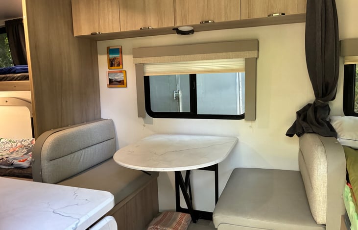 Dinette for 4 and a convertible sleeping option.