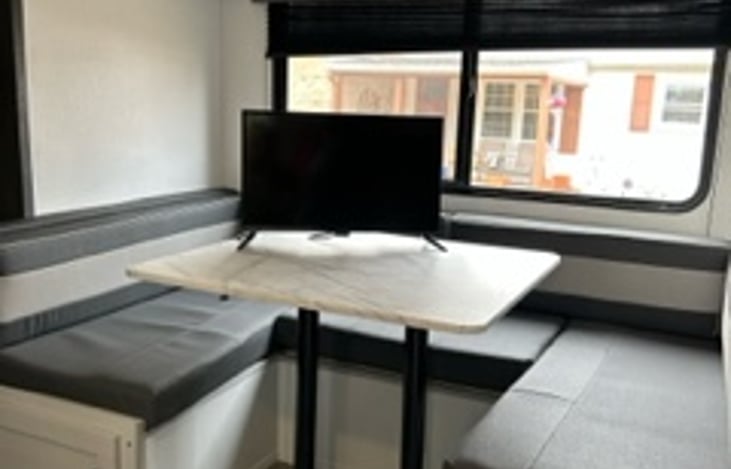 Dining area doubles as a full size bed.