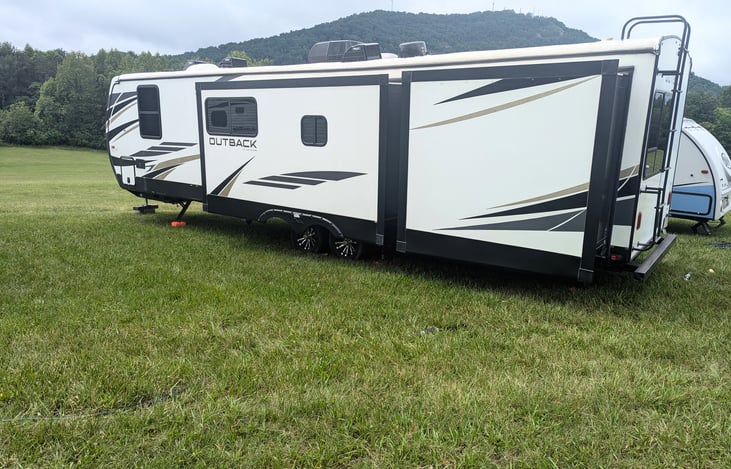 Fully loaded Keystone Outback equipped with 3 slides, spacious living room, private bunkhouse, large outdoor kitchen, large pop-up TV, outdoor speakers, spacious bathroom, and more. Sleeps 10!