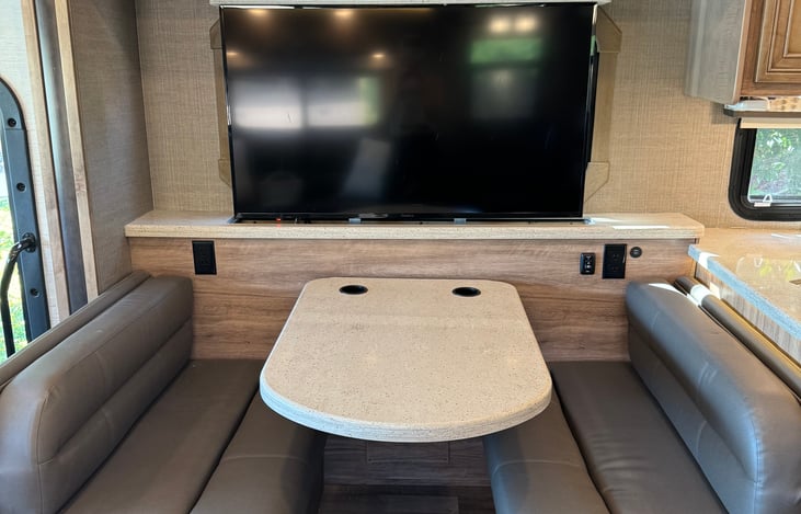 With the push of a button, the TV rises out of the wall.