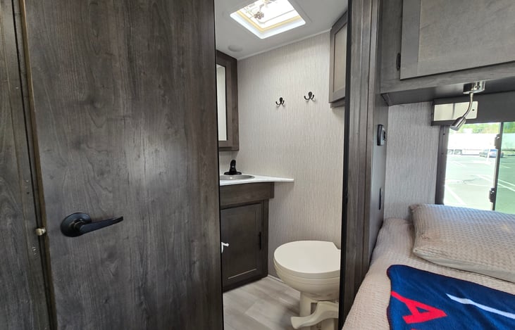 Bathroom door locks open to create a private Master Bedroom / Bath / Dressing room.