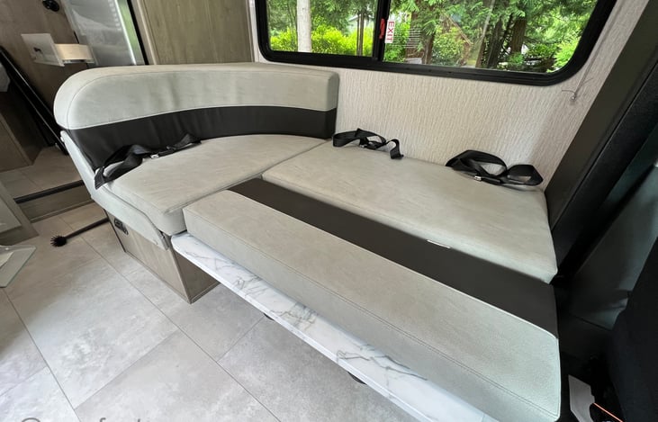 Dinette can convert to a bed that can sleep up to 2 small children.