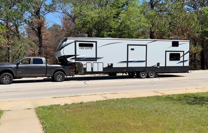 Full hooked up and ready for delivery, this photo is showing Other side of RV to show pull out and storage compartments