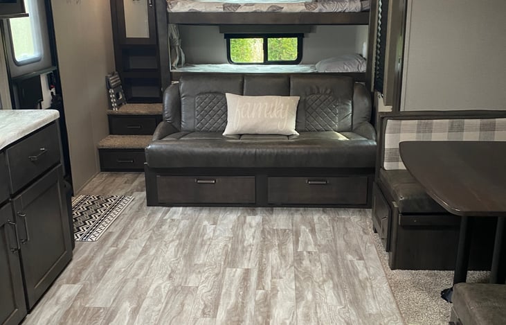 Hang out and watch TV or play games with your family in the comfortable, spacious living area.