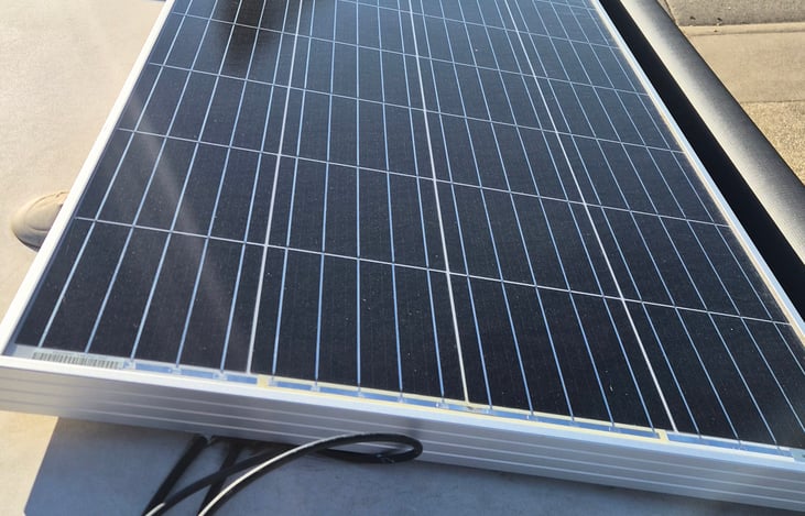 2 solar panels on top of roof.