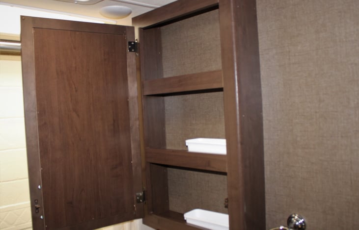 Spacious medicine cabinet.