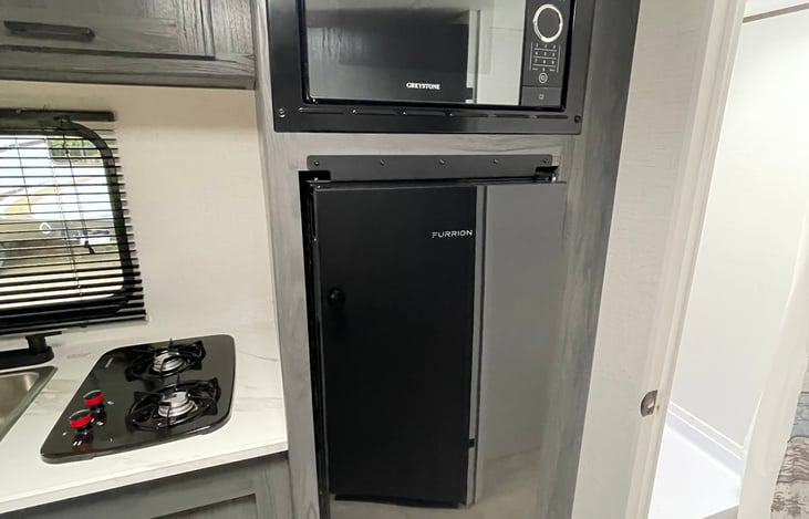 fridge. microwave and stove top