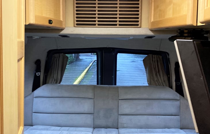 Two additional seatbelts on back bench.