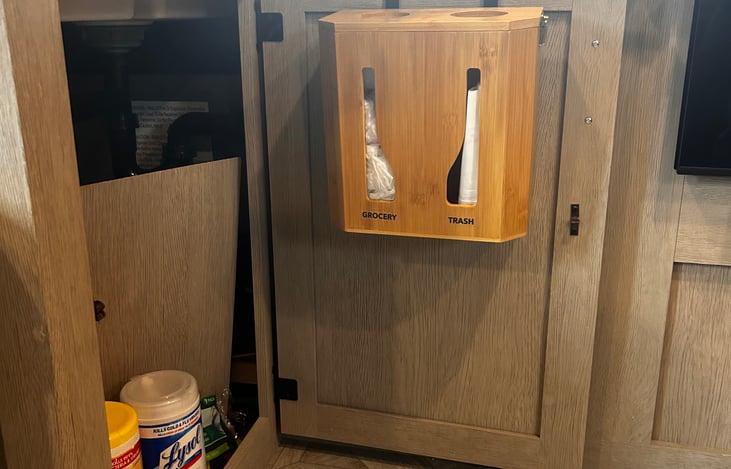 Cleaning supplies and bag organizer under sink