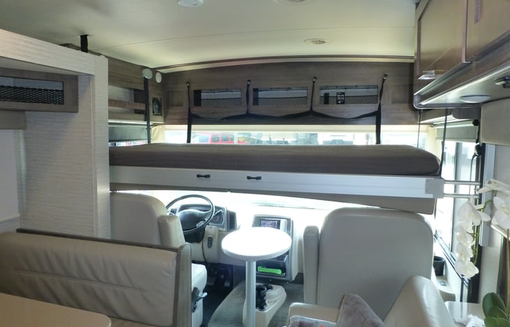 Retractable bed over driving area.