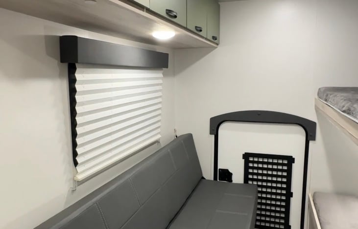 Sit in the day, unfold and sleep at night. We provide a compfy mattress to atop of the unfolded couch that extends over to the bottom bunk for ultimate nighttime comfort.