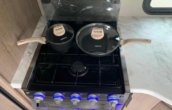 Stocked with pots and pans.