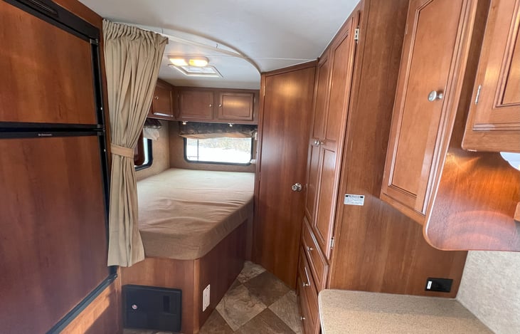 Permanent bed here, 54" x 80". For comparison, closest in size to full/double, which is 54" x 75".