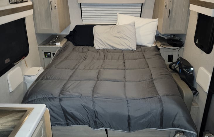 Large full murphy bed that stores up during the day for a 3 person couch recliner