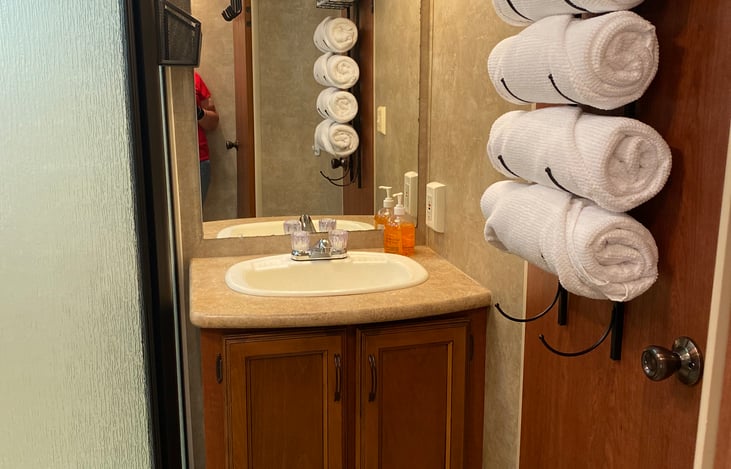 Private bath with shower and towels provided.