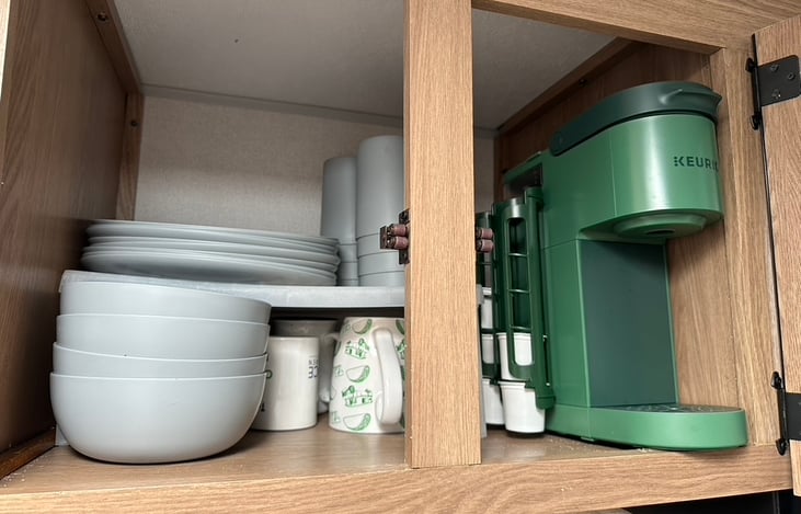 Storage above sink and Keurig coffee maker