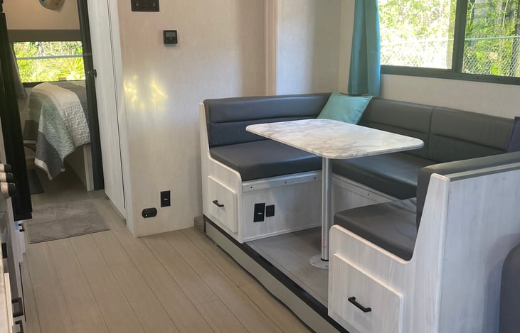 The table swivels out of the way for easy access to the seats next to the window.