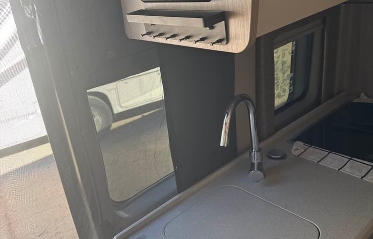 Kitchen, sink, microwave, mini fridge, 2 burner cooktop