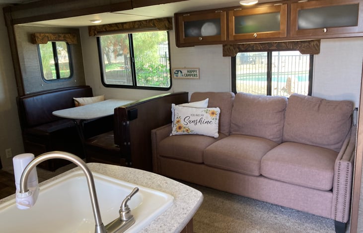 Pull out bed couch, Dining table also converts to bed, common area.