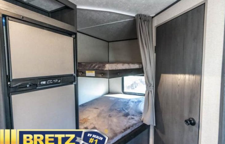 Full size bunks with privacy curtain