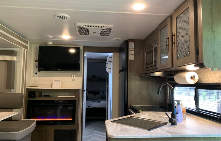 Fireplace for ambiance and/or heat on cold days.