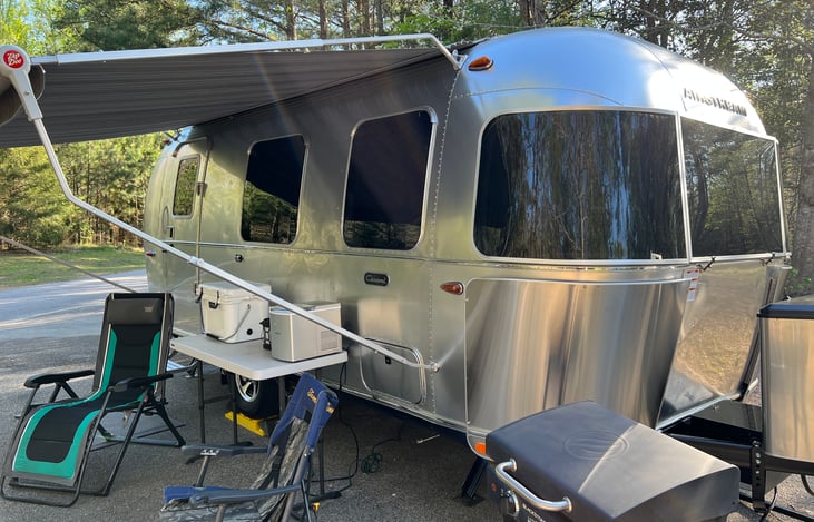 Side view. Chairs and Blackstone grill all setup.