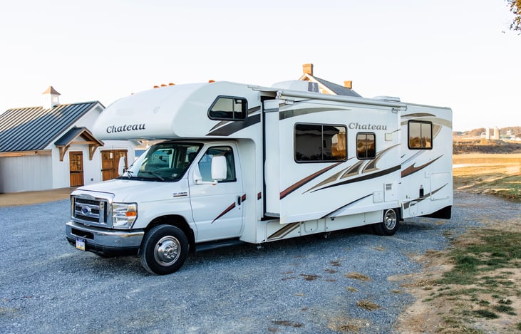 Single slide out on drivers side. Very simple to extend/retract.